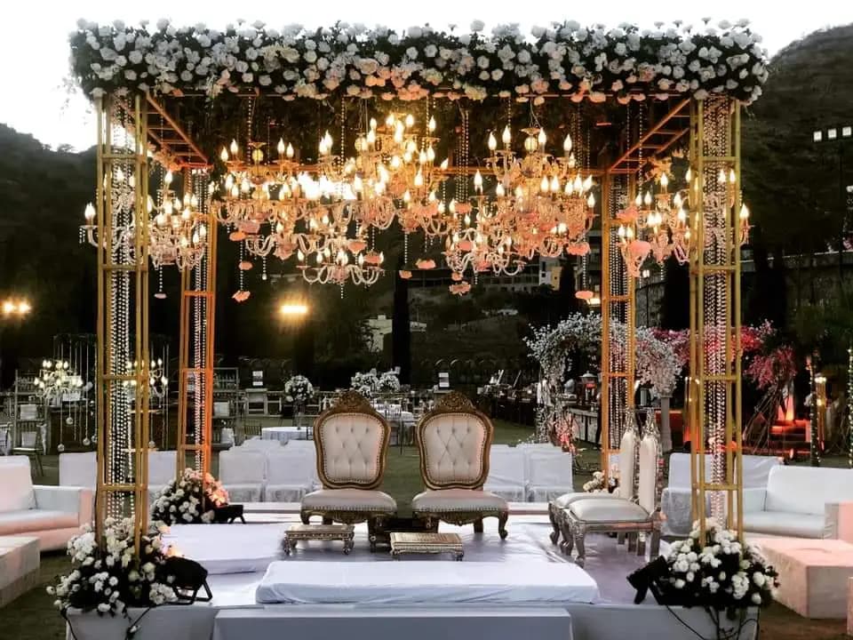 Chandelier wedding mandap with a floral canopy