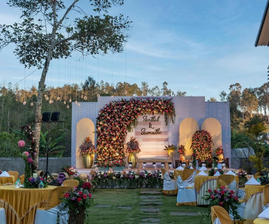 Garden wedding stage with flowers